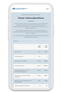 Auf dem Bildschirm eines Smartphones ist der Jahresbericht der Vereinigten Volksbank eG Bramgau Osnabrück Wittlage zu sehen