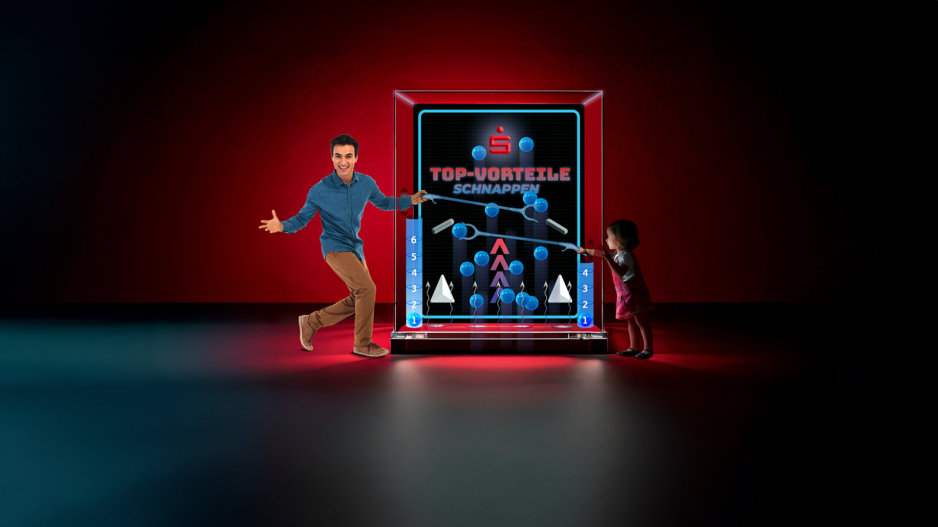 Payback Promotion für die Sparkasse mit einer Graswand in der Payback-Bälle in die Luft gepustet werden und die Kunden die Bälle mit einer Zange fangen müssen. Wenn Sie alle Punkte in der Säule ablegen könne, gibts tolle Prämien.