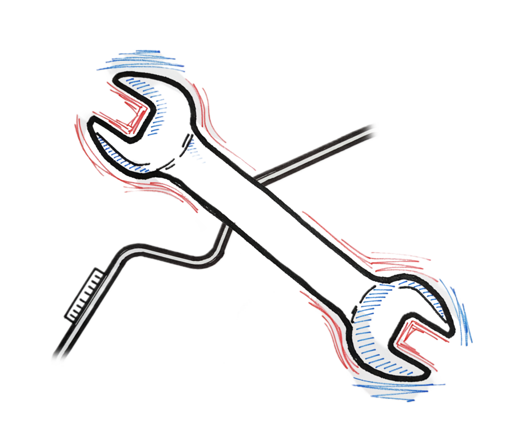 mit Markern gezeichneter Werkzeugschlüssel und eine stilisierte Rennstrecke